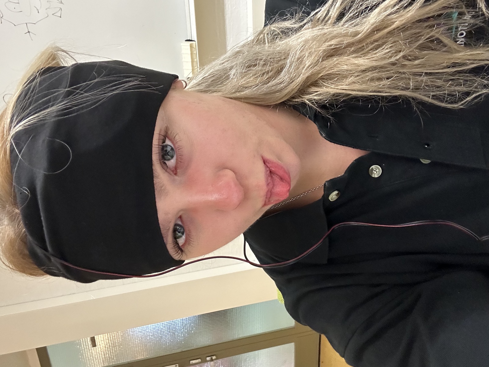 Wearing a transcranial alternating current stimulation headband during a test session.
