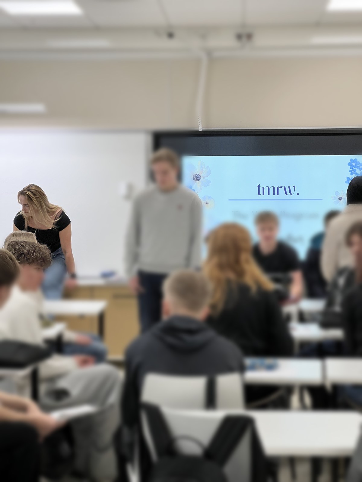 A school visit in progress, tmrw. programme slide on the screen.